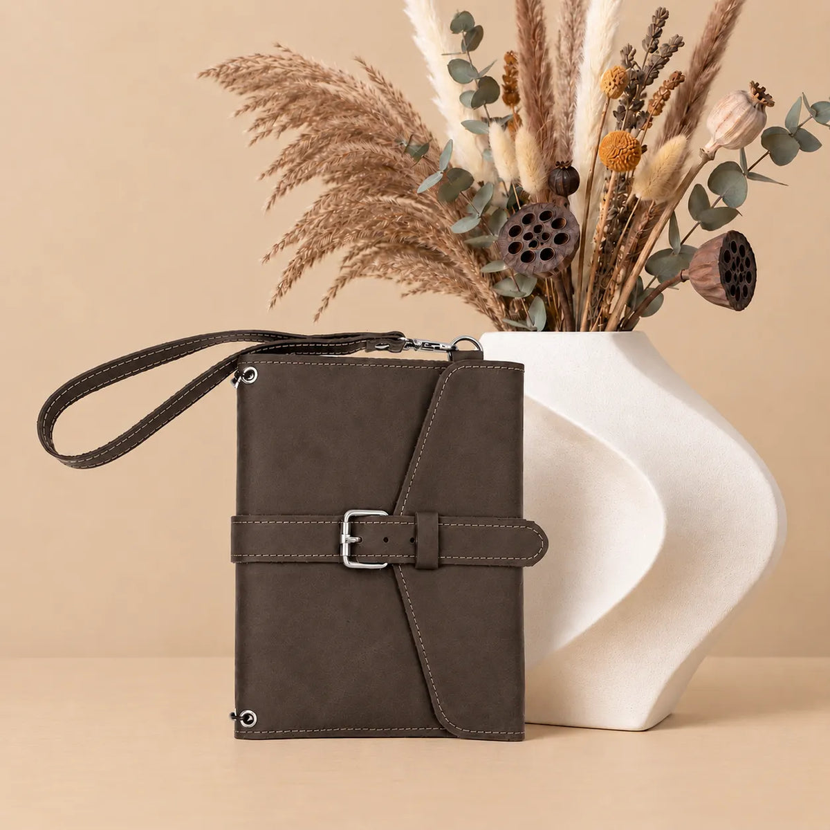Genuine leather notebook cover with practical pockets and detachable wrist carrying strap