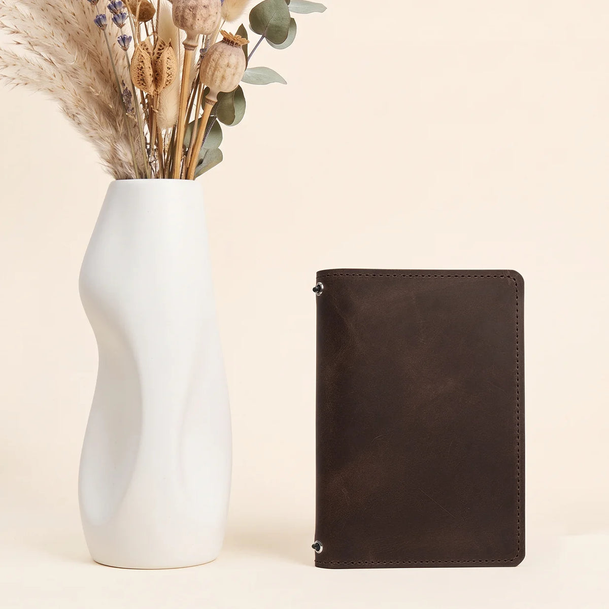 Leather notebook cover made from genuine Crazy Horse leather with practical organization