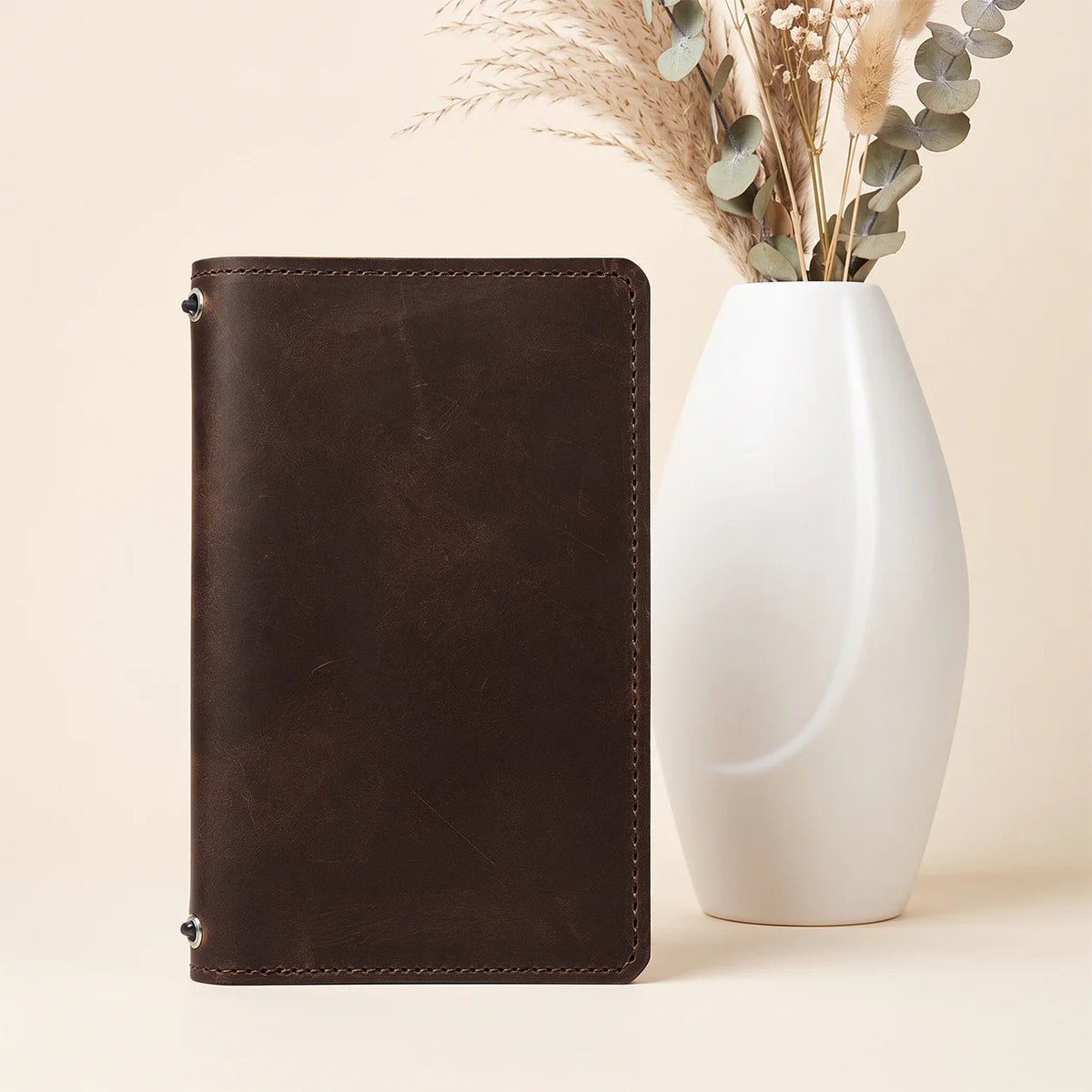 Genuine leather writing cover with two elastic straps and convenient built-in pockets