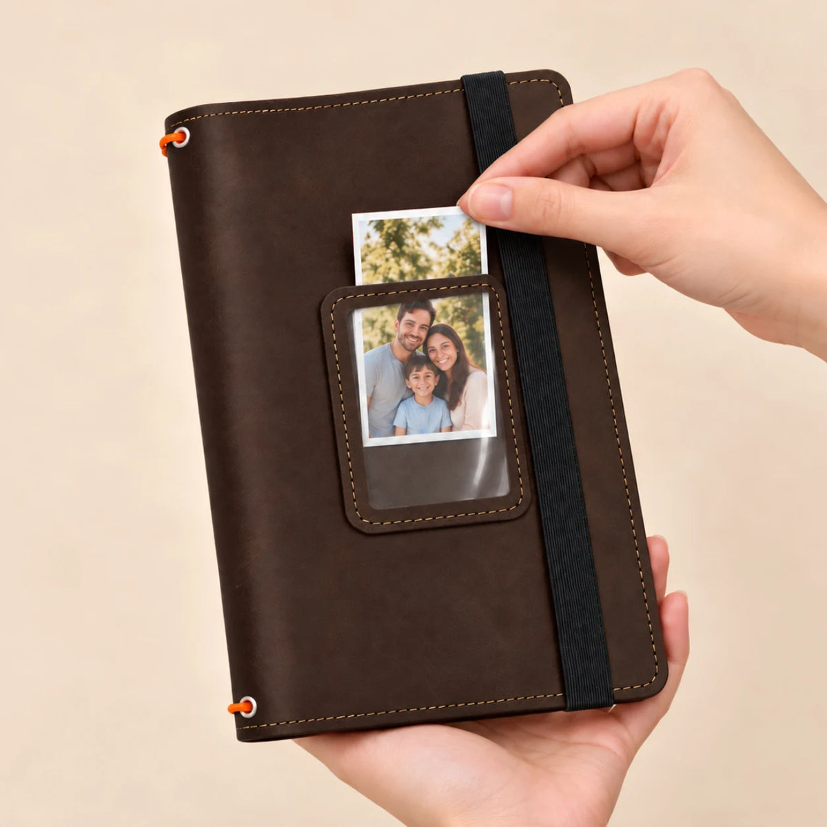 Genuine leather journal organizer featuring three elastic cords, internal pockets, and a clear photograph compartment.