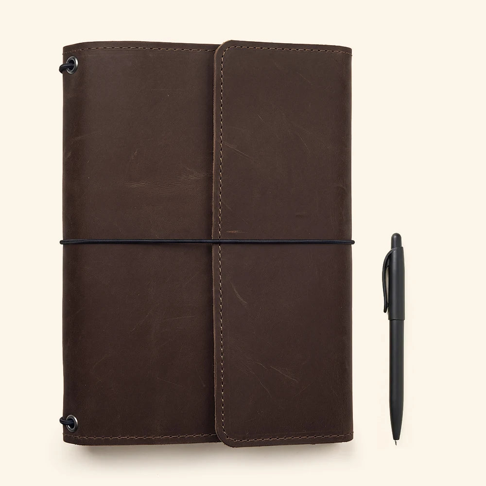 Premium leather notebook organizer with timeless design and convenient inside utility pockets.