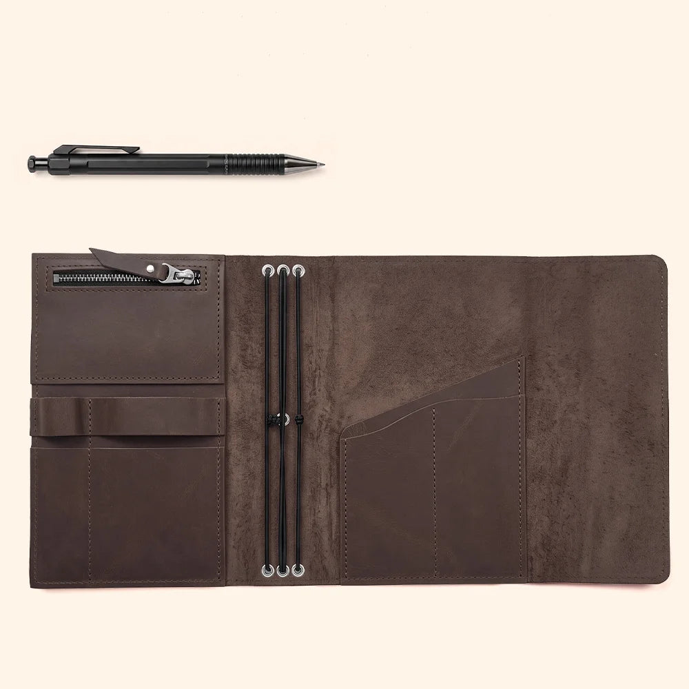 Brown leather notebook organizer with internal card slots and a secure writing instrument loop.