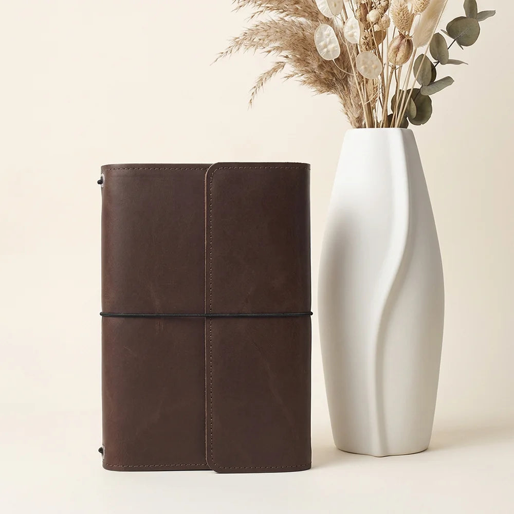 Premium genuine leather notebook cover with interior pockets for everyday organization