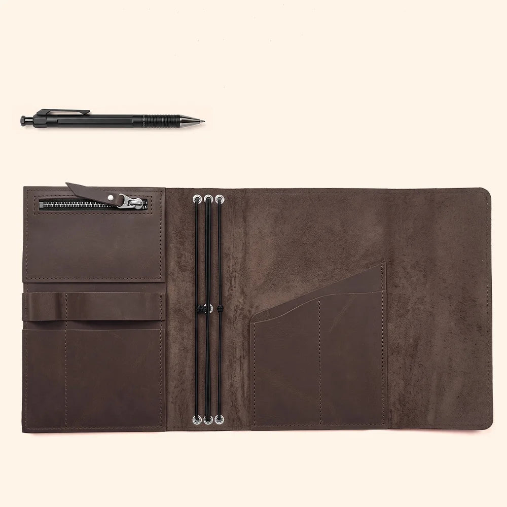 Authentic leather notebook case with practical storage sections and an easy-access pen holder.