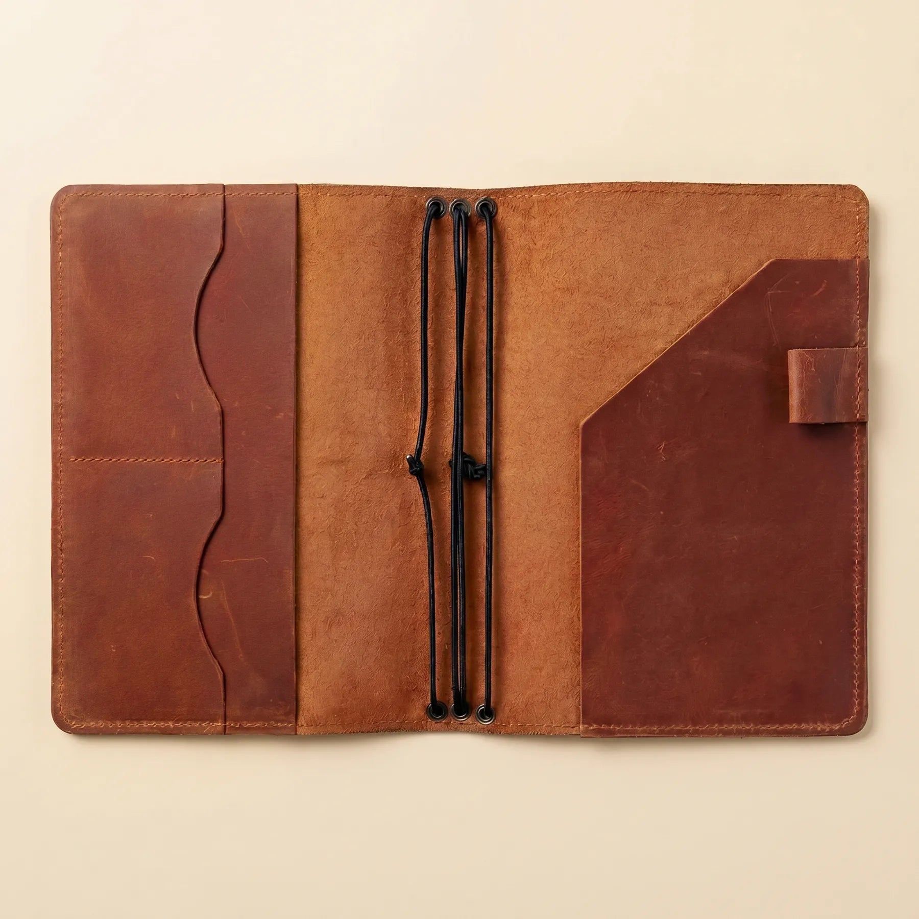 Handcrafted leather cover for refillable notebooks with premium artisan workmanship.