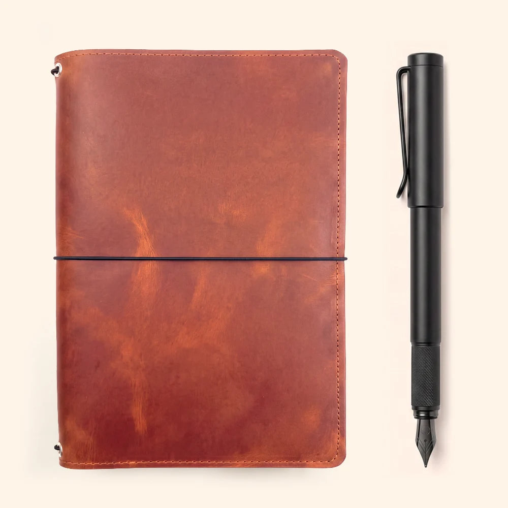 Genuine leather travel journal cover designed with three elastic bands inside.
