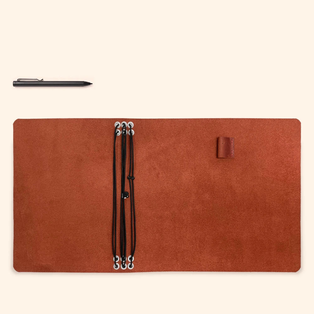 Leather notebook portfolio featuring six flexible holders and an integrated loop for pens.
