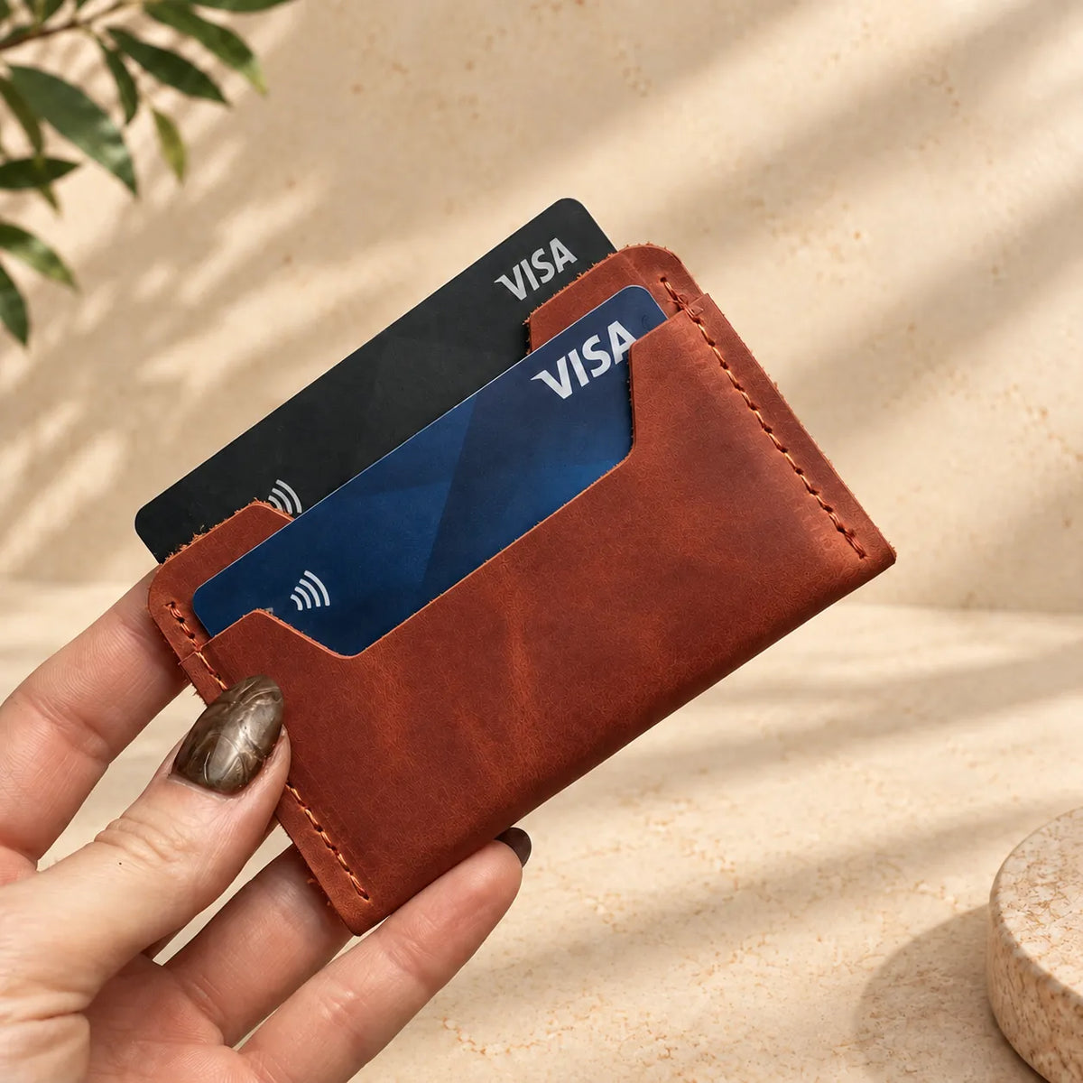 Genuine leather card holder measuring 3.9 by 2.8 inches