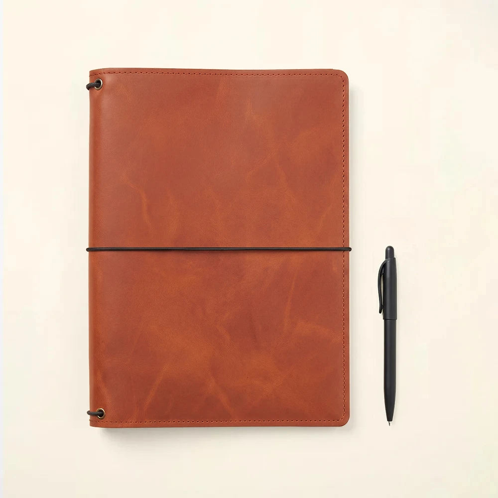 Leather writing journal case with interior organizers and three secure elastic notebook bands.