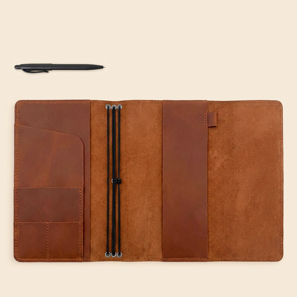 Genuine leather notebook folio with handcrafted details and organized interior for everyday essentials.
