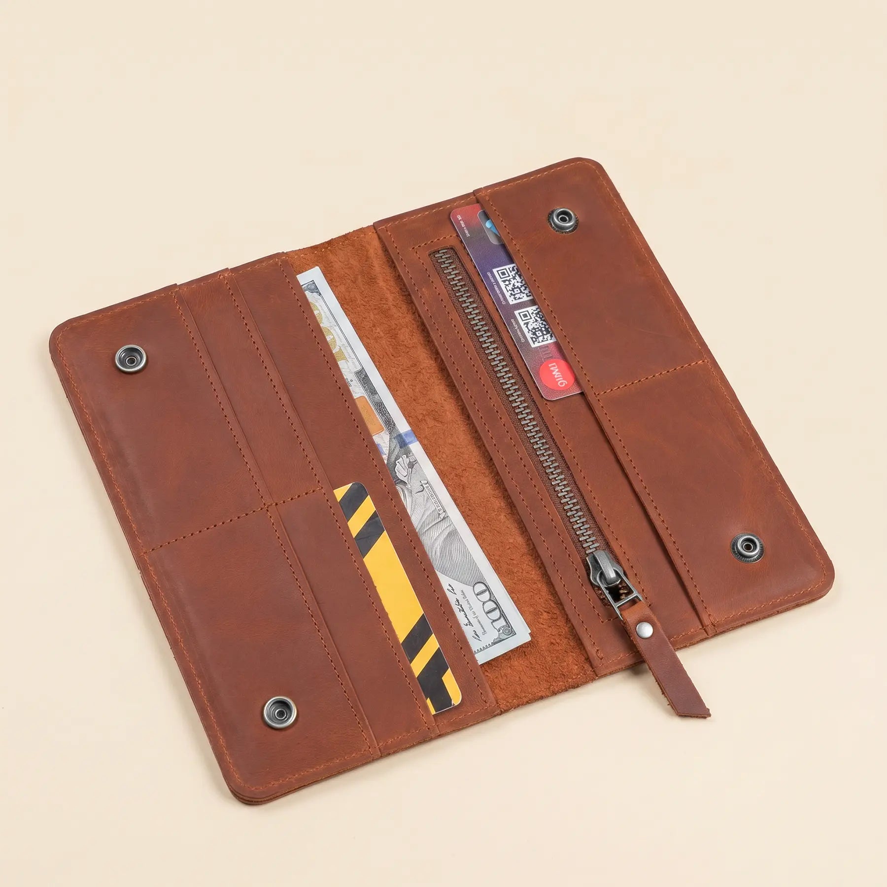 Elegant genuine leather wallet offering organized card storage, cash sections, and zippered interior pocket.