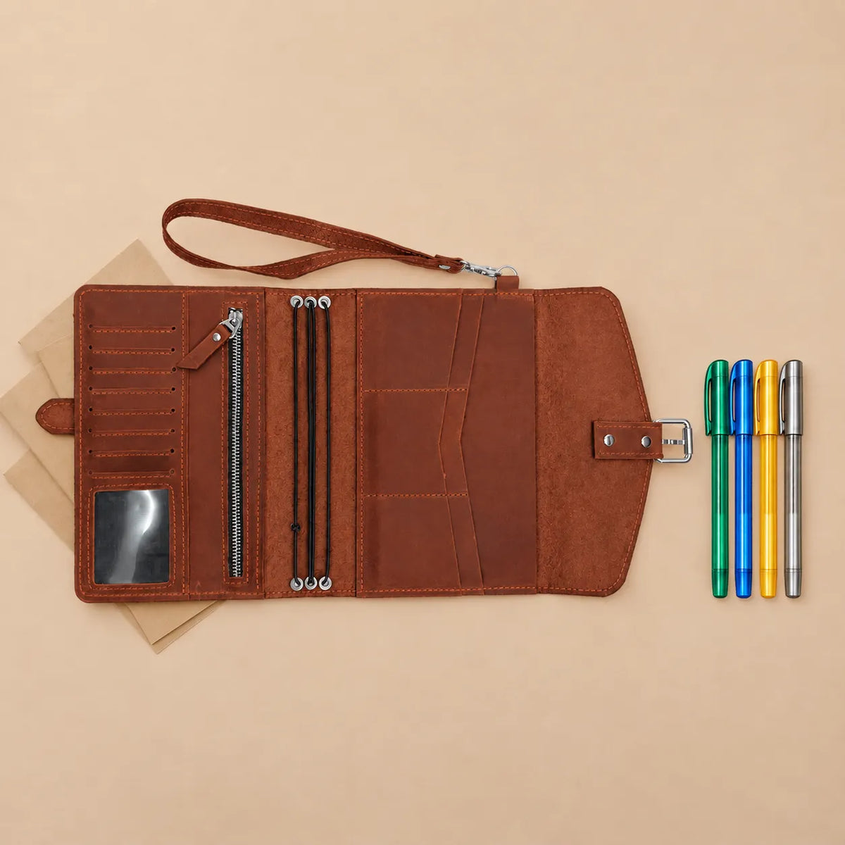 Genuine Crazy Horse leather notebook cover with interior pockets and wrist strap