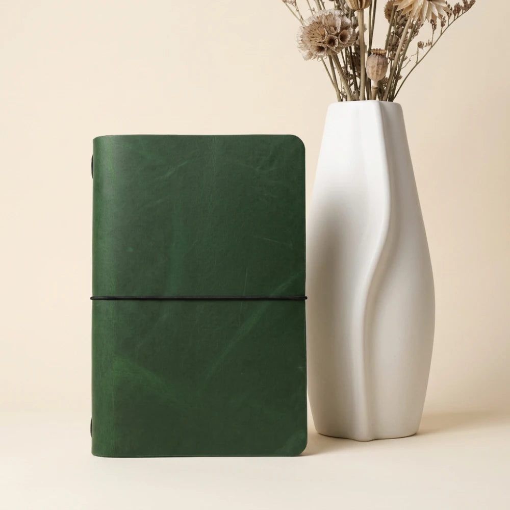 Handcrafted natural leather journal cover featuring a clean design and simple notebook.