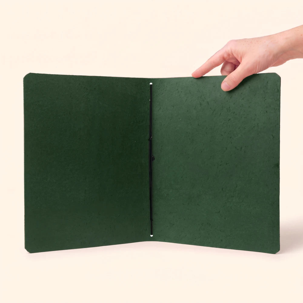 Simple handcrafted notebook cover made for keeping a journal protected and organized.