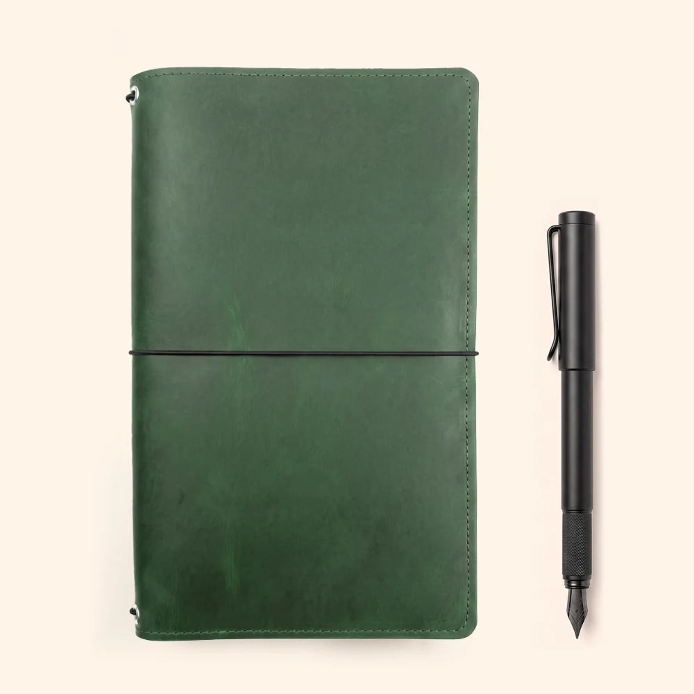 Natural leather insert holder with three internal elastic cords for easy refilling.