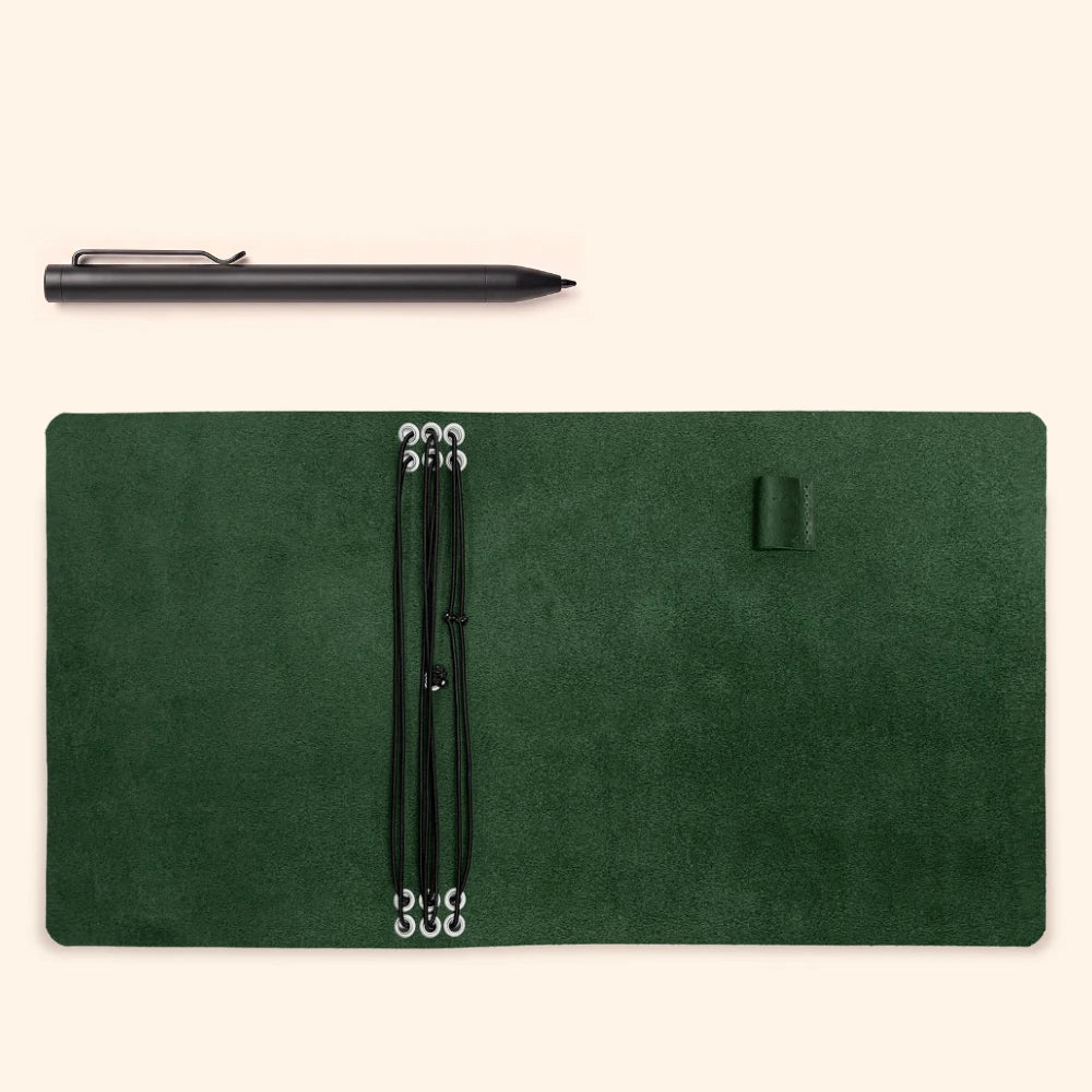 Handmade notebook cover in natural leather featuring six flexible elastic straps.