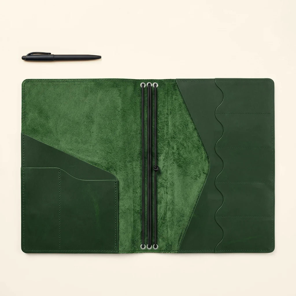 Handcrafted journal cover with clean lines and functional interior arrangement.