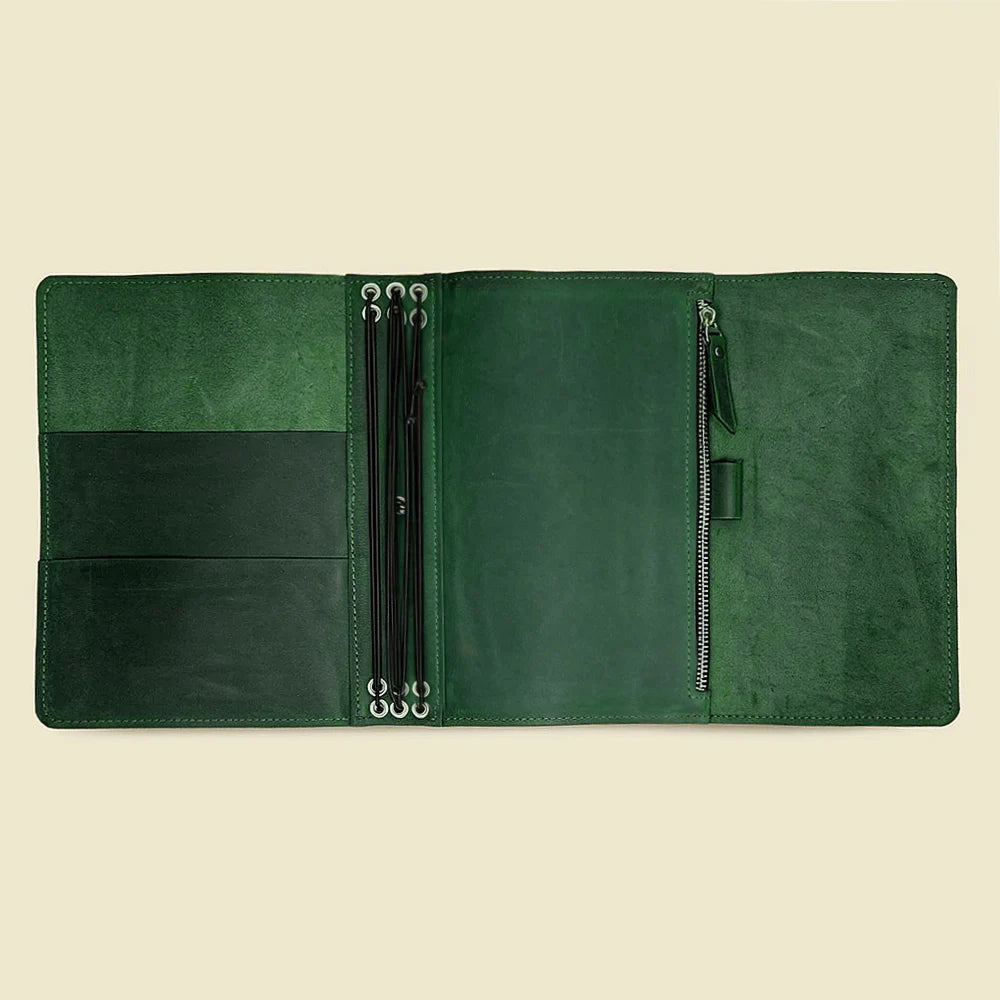 Premium leather journal organizer with storage pockets and six durable elastic notebook holders.