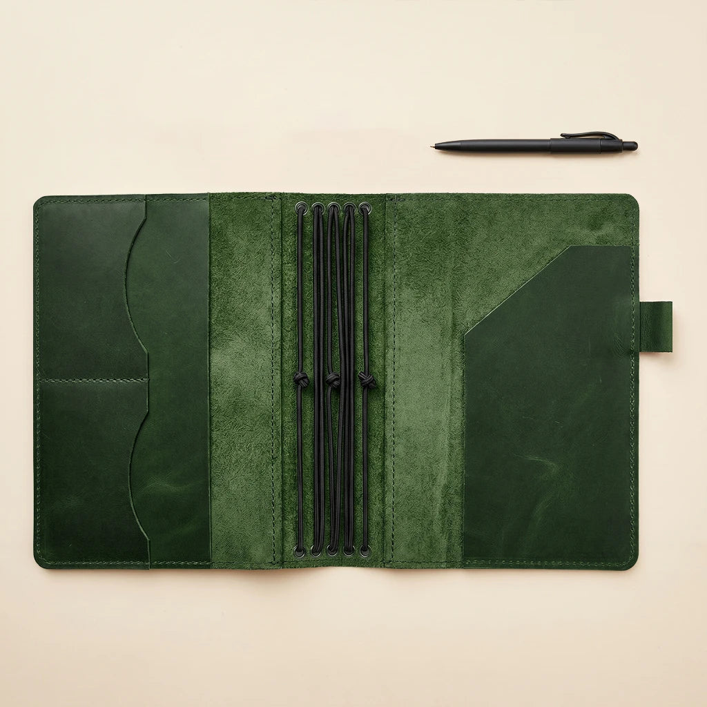 Artisan leather journal cover with five insert elastics and organized interior