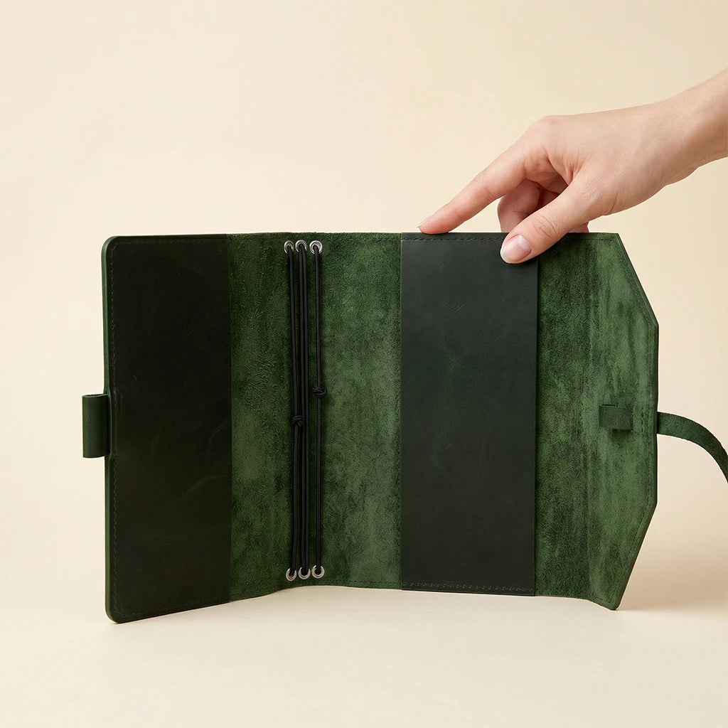 Leather notebook cover designed with elastic bands for secure everyday use.