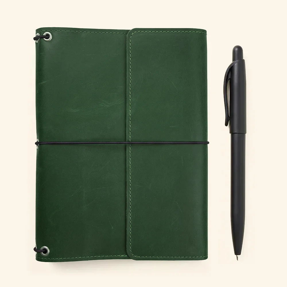 Leather notebook cover with organizer pockets for travel journals, planners, and writing notebooks.