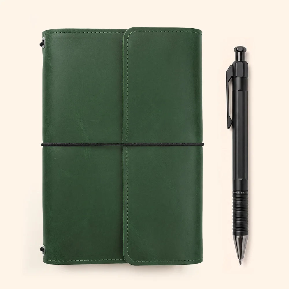 Leather planner case with carefully arranged pockets and an integrated holder for favorite pens.