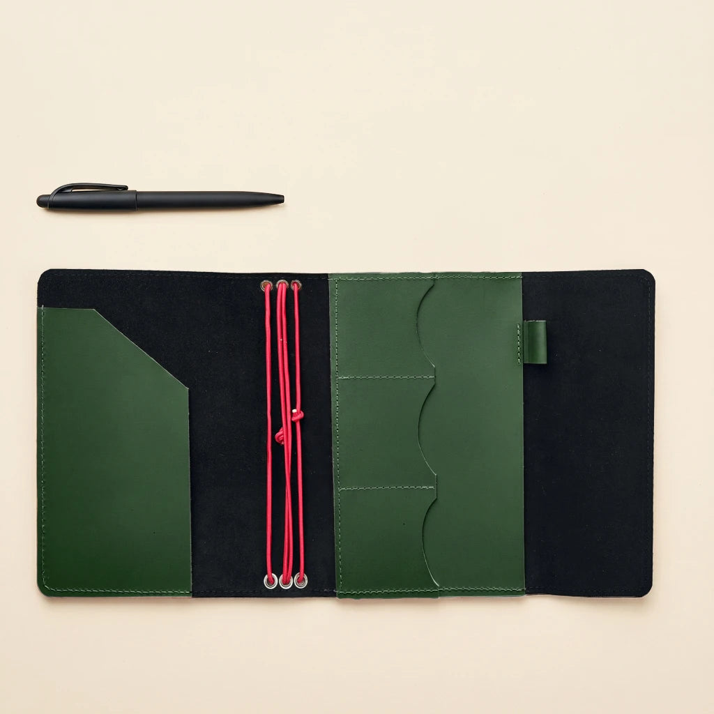 Genuine leather notebook binder cover with elastic bands and pen holder feature