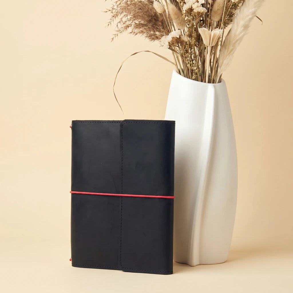 Genuine leather notebook holder with elastic bands, card slots, and pen loop