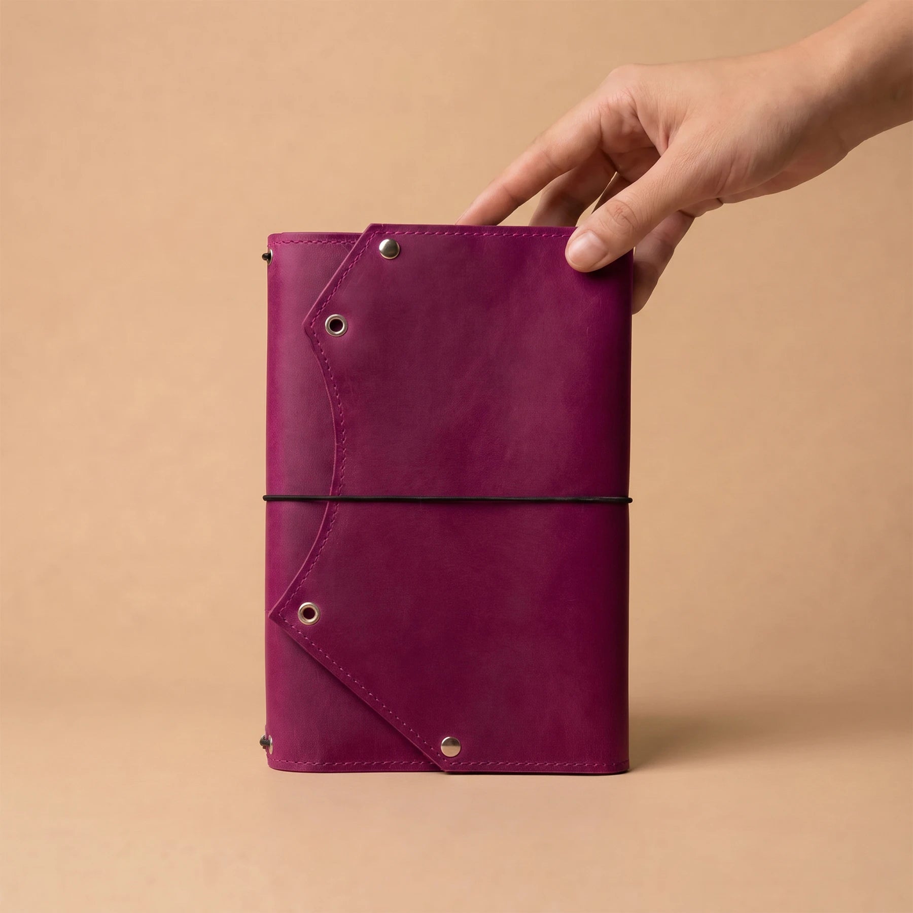 Genuine leather notebook organizer with interior zipper storage for cards, receipts, and keys.