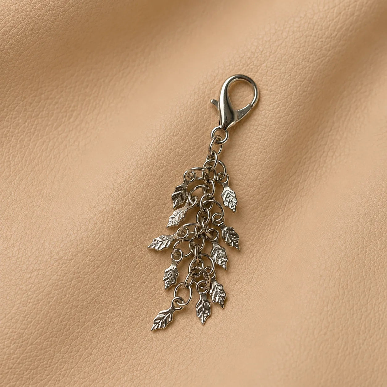 Decorative leaf journal charm for traveler's notebook elastic band, handcrafted elegant notebook accessory.