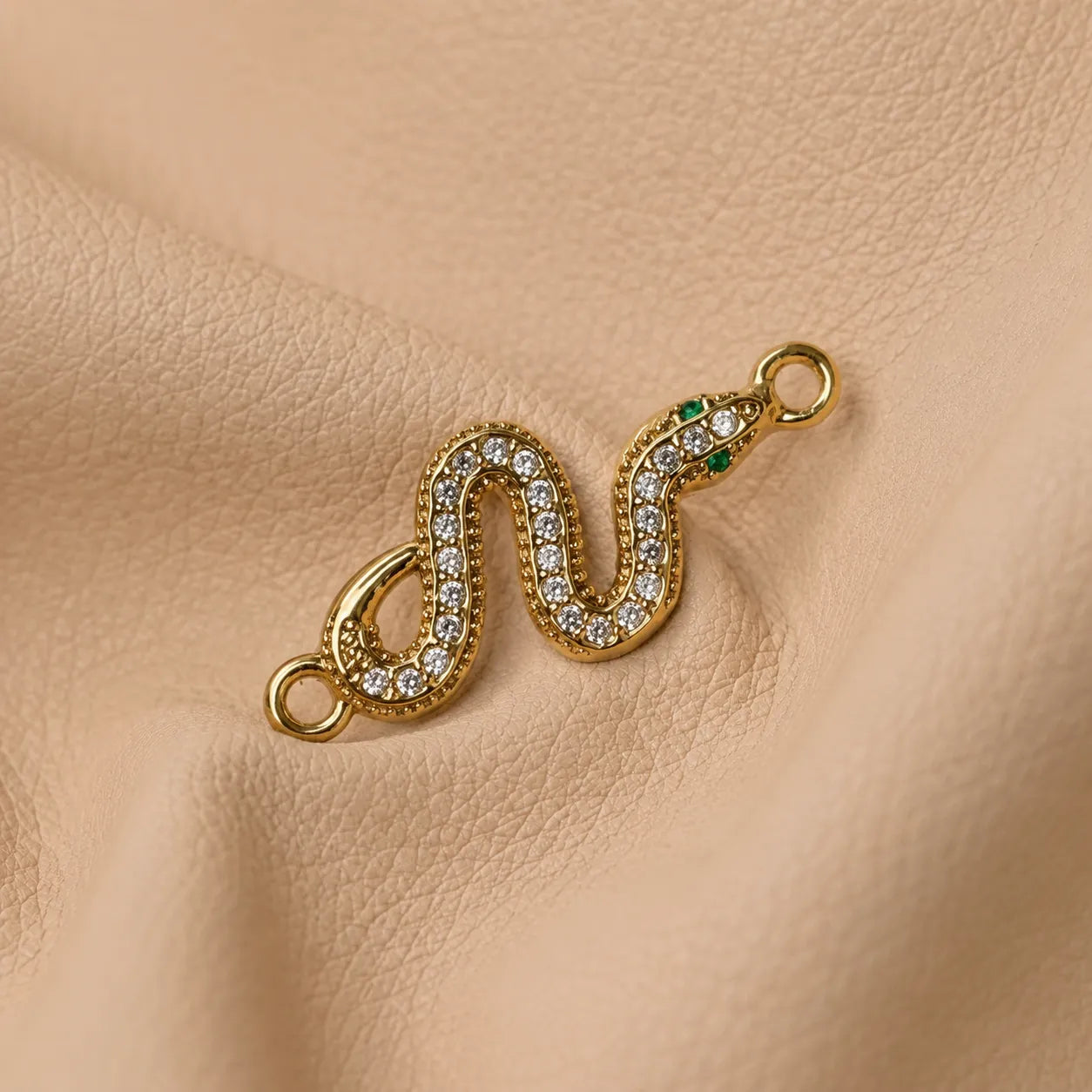 Snake-shaped journal charm attached to elastic band, decorative accessory for leather notebook cover