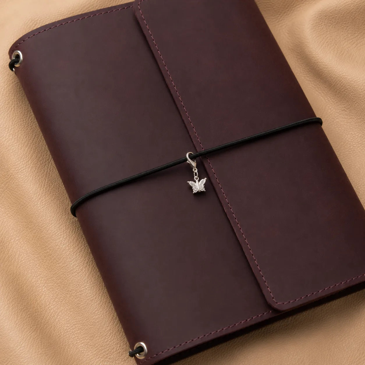 Decorative butterfly journal charm for notebook elastic, stylish metal embellishment for planners and diaries.