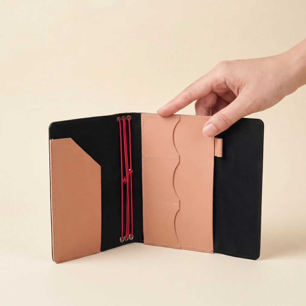 Leather journal cover with elastic closure and handmade craftsmanship