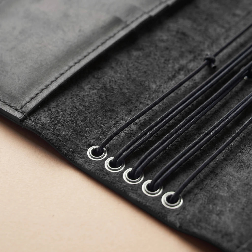 Premium leather planner case with secure notebook holding elastics