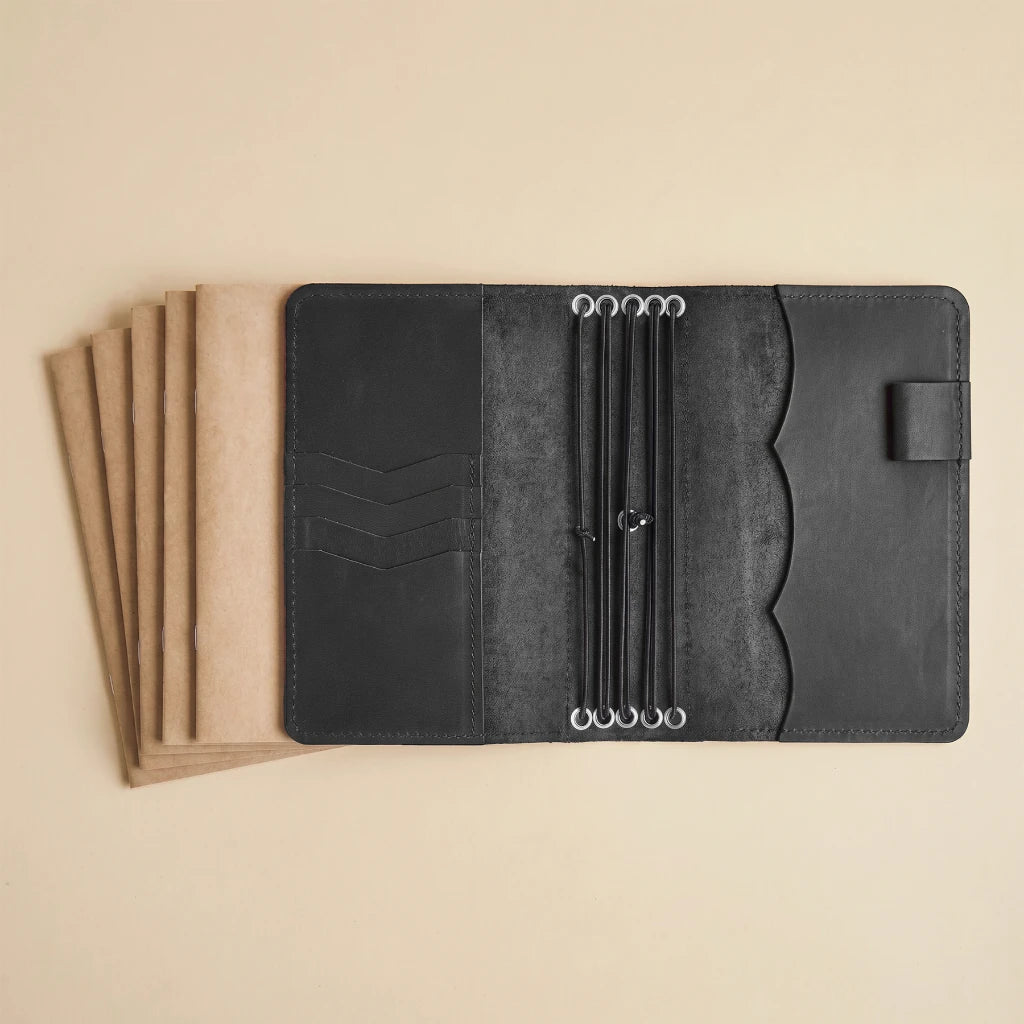 Refillable leather cover for journals with practical interior layout