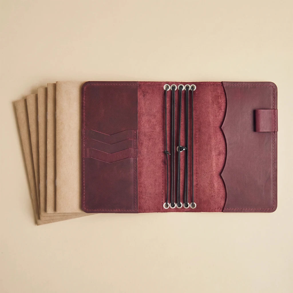 Leather organizer for notebooks with pen holder and inner sleeves
