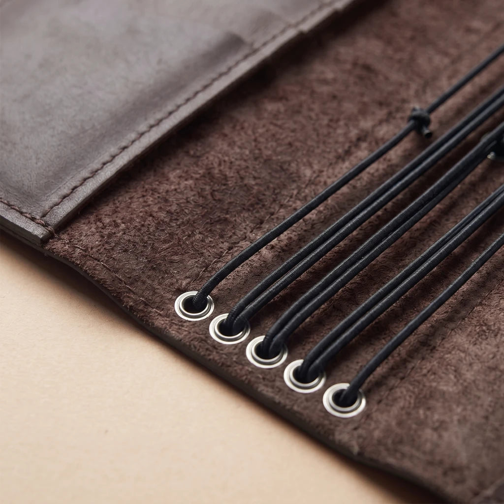 Genuine leather notebook wrap with flexible insert management system