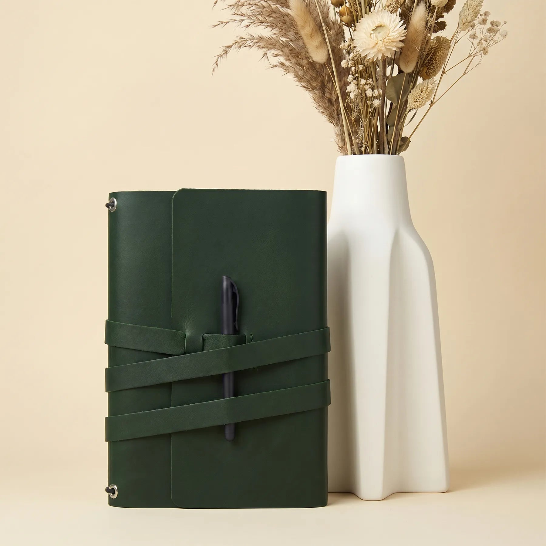 Genuine leather notebook cover with stylish pen loops ideal for business and travel.