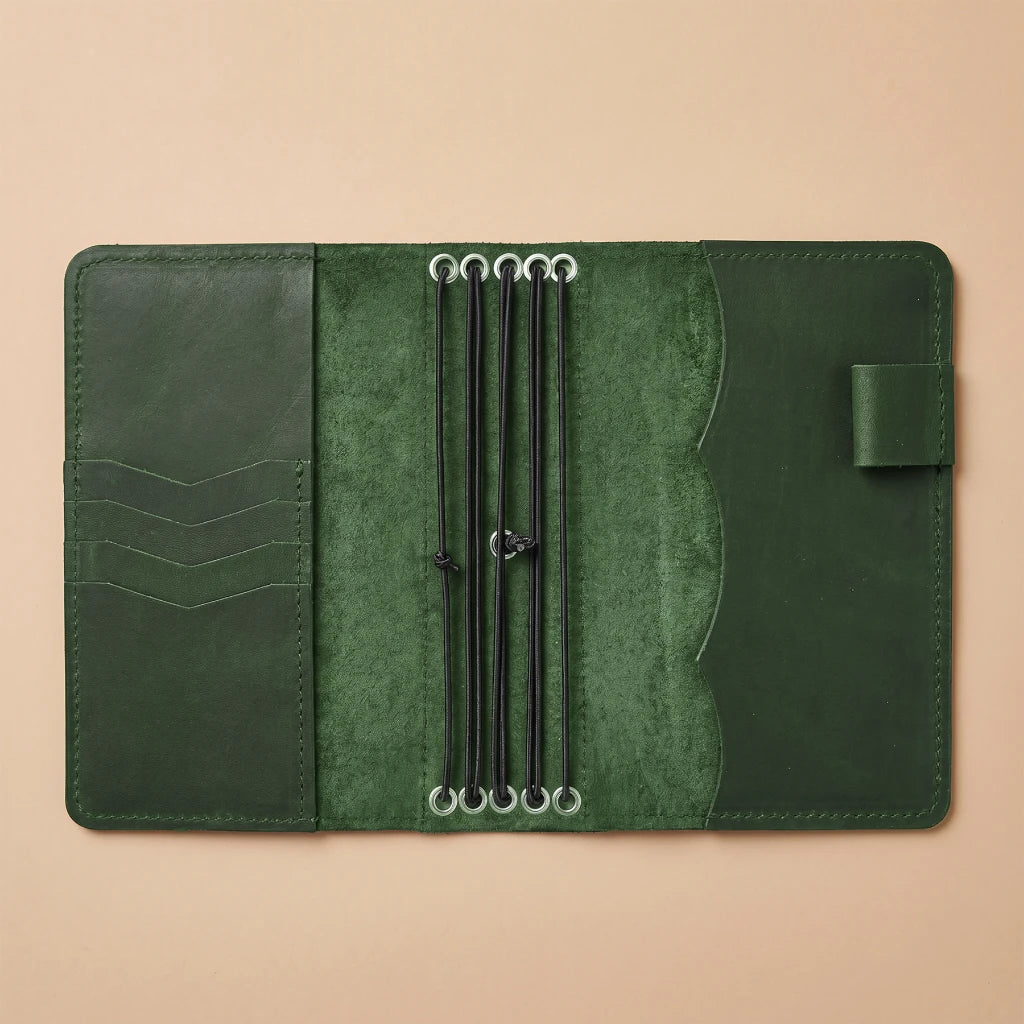 Genuine leather planner cover offering space for essentials and notebooks