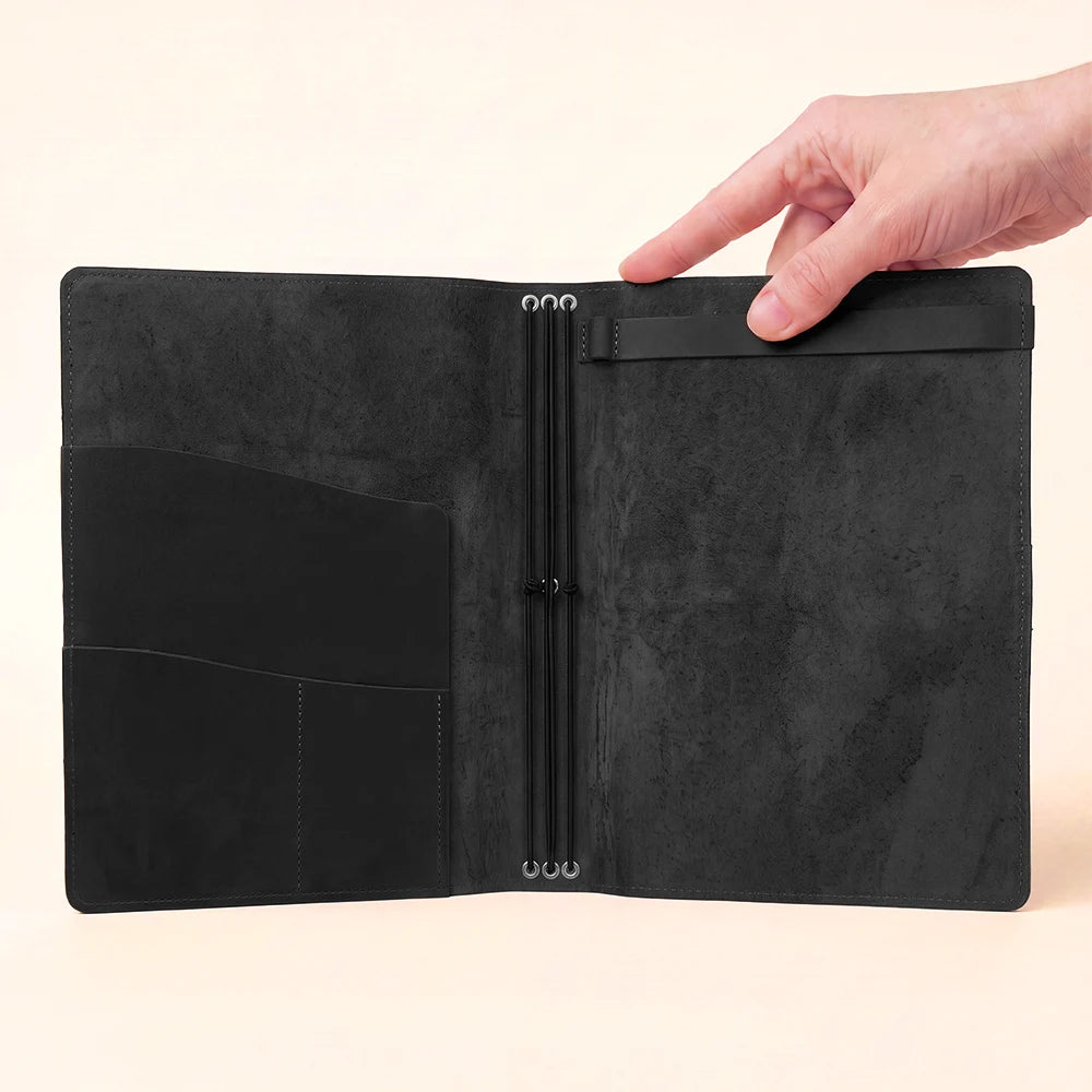 Handmade natural leather notebook cover with functional storage and elastic insert bands.