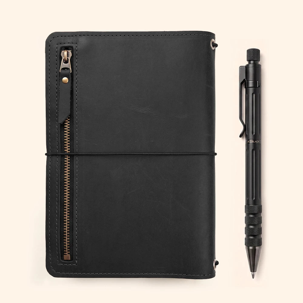 Premium refillable notebook cover with leather interior organization for work essentials.