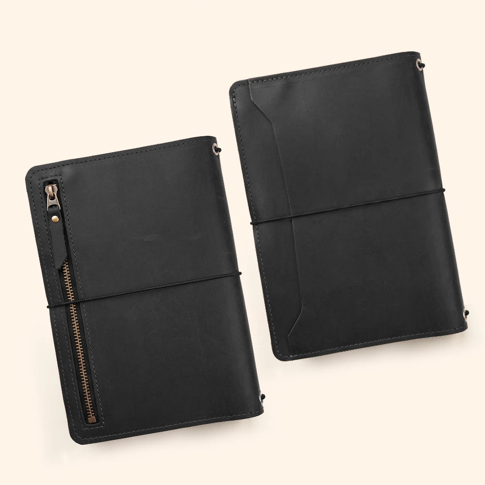 Rustic leather notebook cover including functional storage pockets and integrated pen holder.