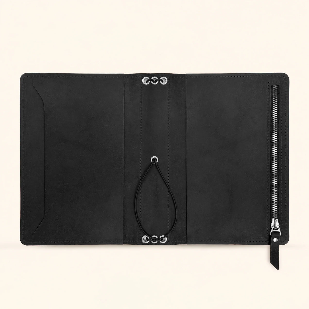 Handmade leather notebook cover featuring spacious compartments for notes cards and small essentials