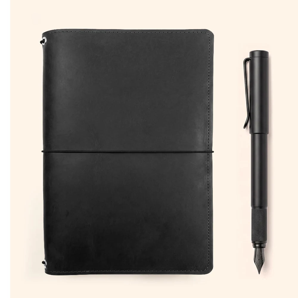Handmade leather travel notebook cover designed with three secure elastic straps.