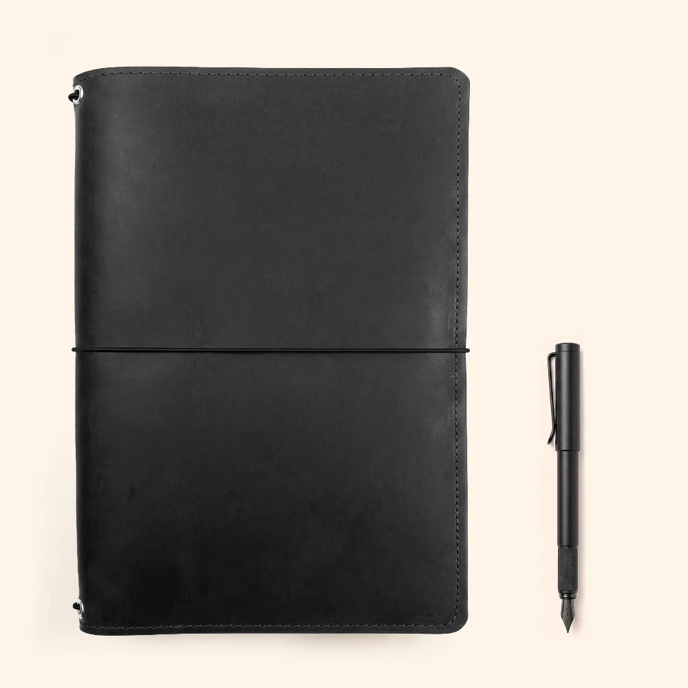 Leather journal organizer designed with triple elastic fastening inside the cover.