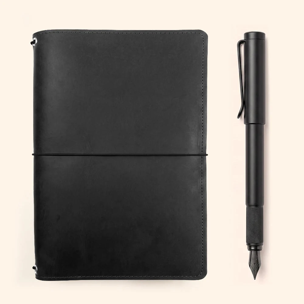 Premium genuine leather notebook cover featuring three internal elastic bands.
