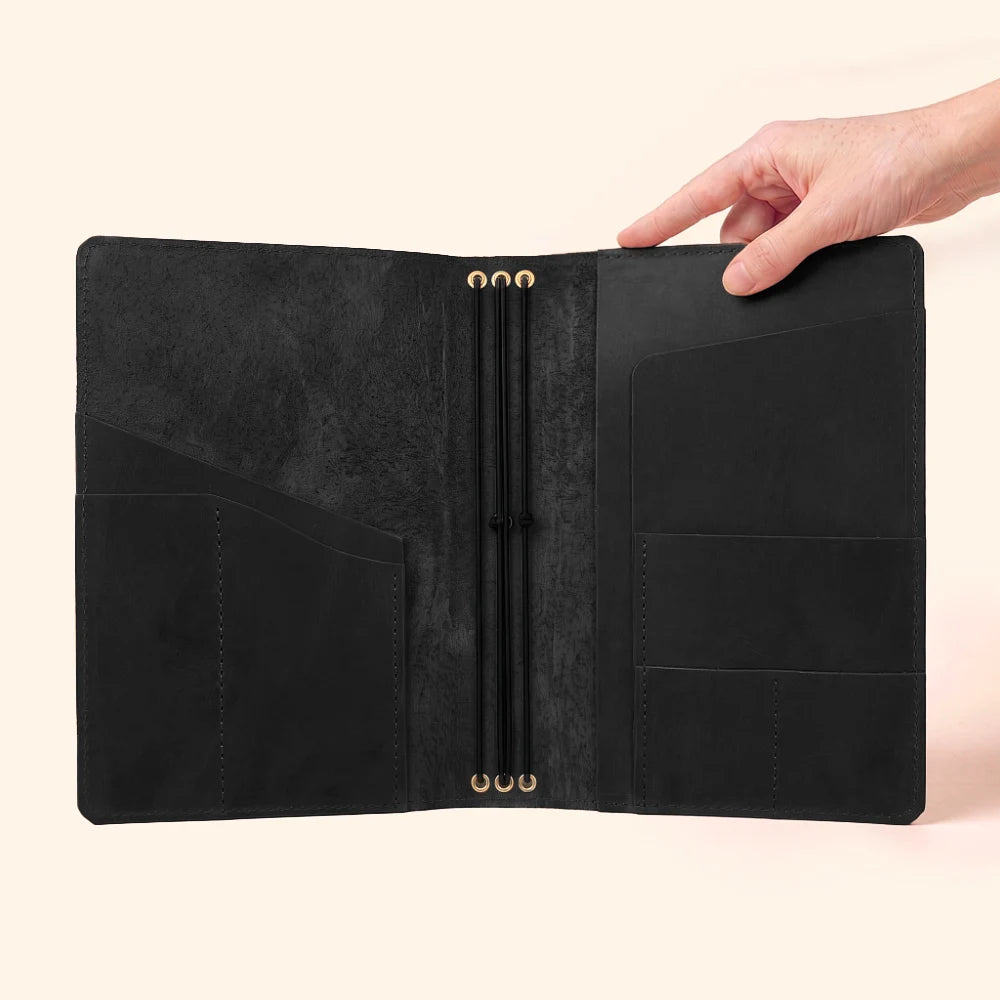 Leather insert cover with three internal stretch bands for easy notebook replacement.