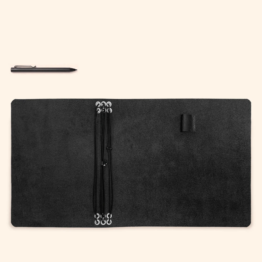 Leather writing wrap equipped with six stretch cords for customizable journal organization.