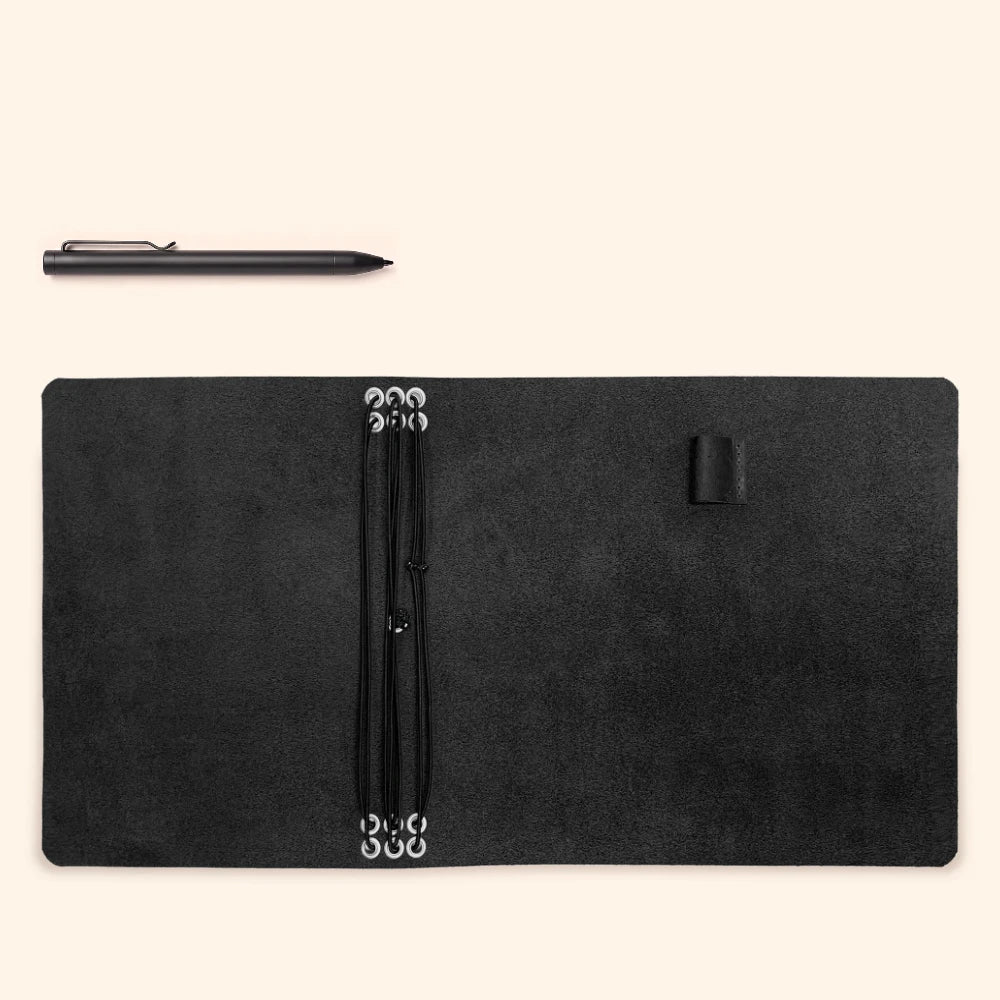 Leather refill organizer featuring six elastic channels for arranging multiple notebook inserts.