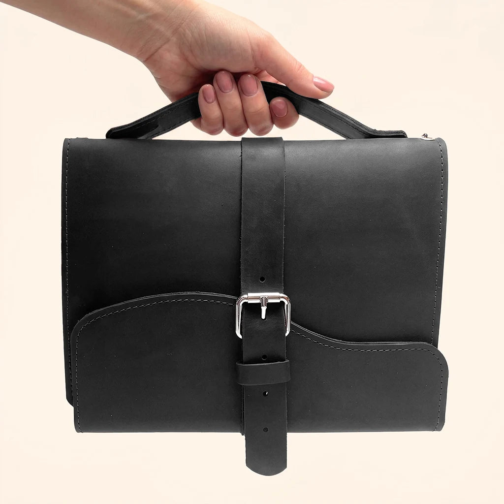 Premium handmade leather organizer featuring three elastic bands and a sturdy carrying handle.